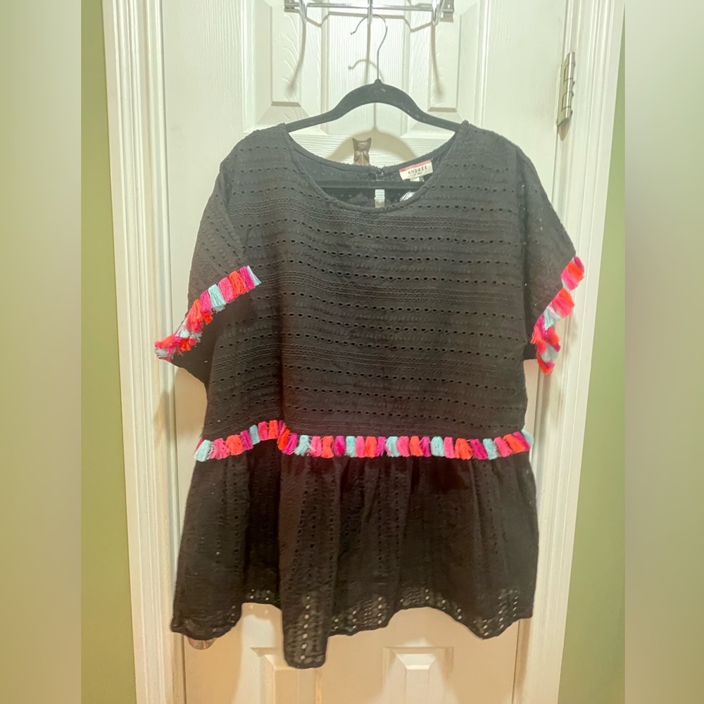 Plus size women’s black 1x boutique top with colorful tassels.